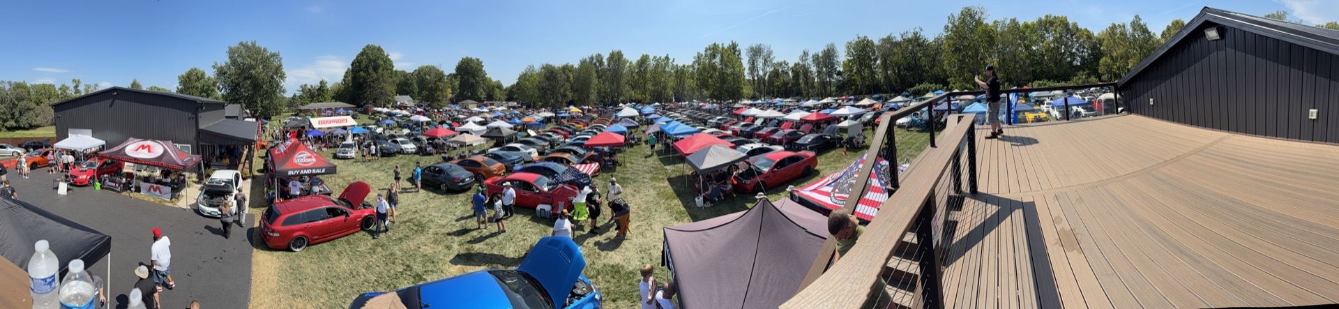 Panoramic view of the car show field packed with Holdens and other cars
