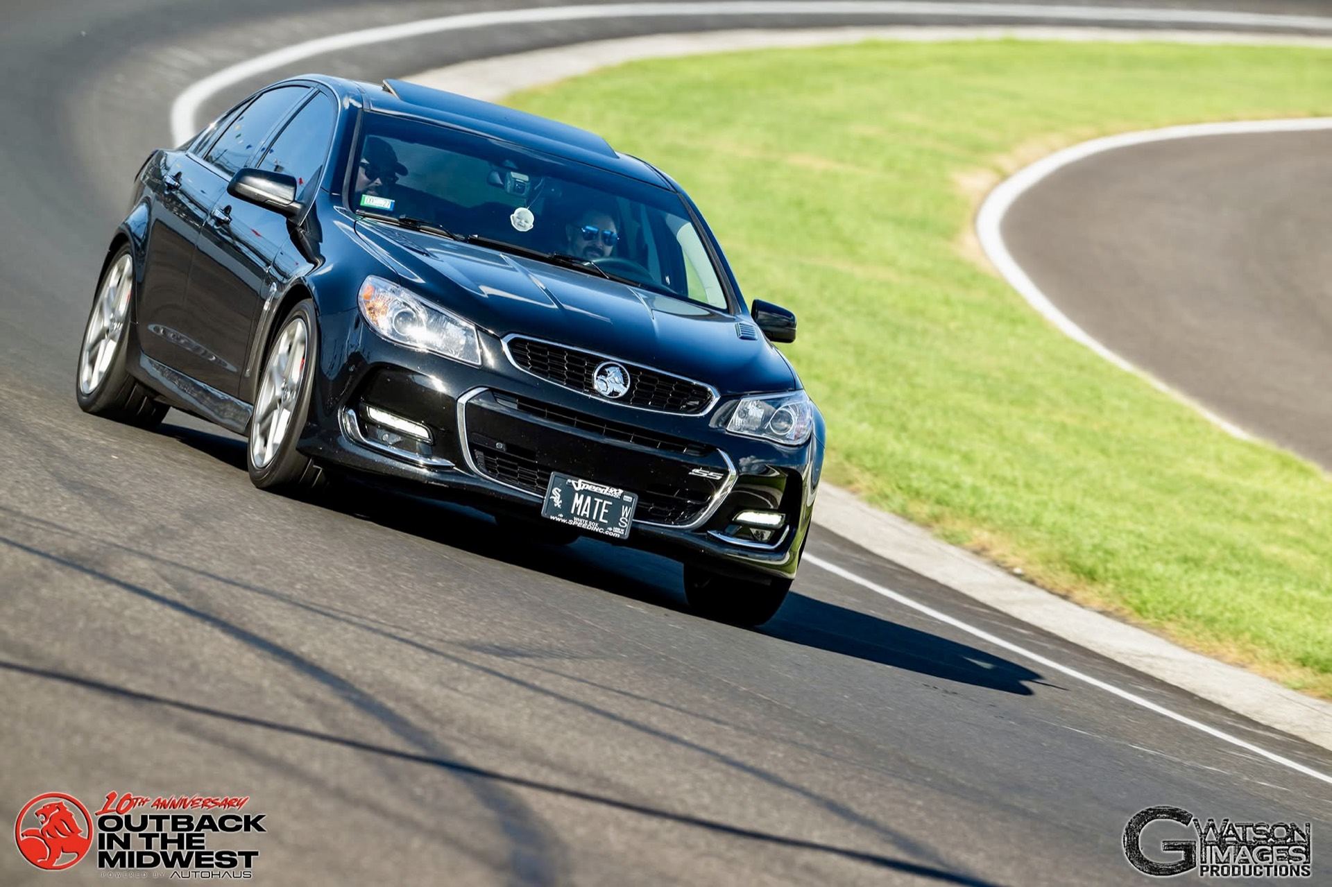Professional on-track shot of the Chevy SS exiting a corner at Indianapolis Motor Speedway